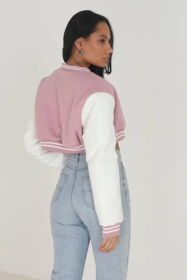 PINK FAUX WOOL LONG SLEEVE CROPPED VARSITY JACKET
